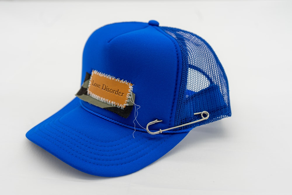 Trucker caps with a broad front and plastic mesh back