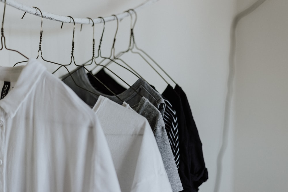 A line of clothing on hangers