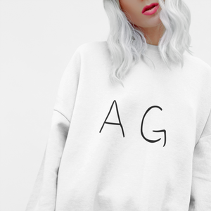 Front view of woman wearing AG sweatshirt